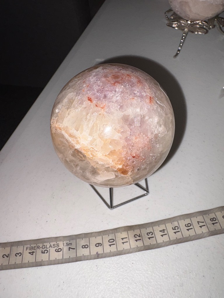 Beautiful pink amethyst drusy sphere with silver stand