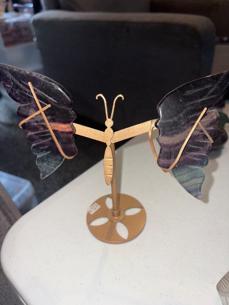Fluorite wings on a golden coloured stand