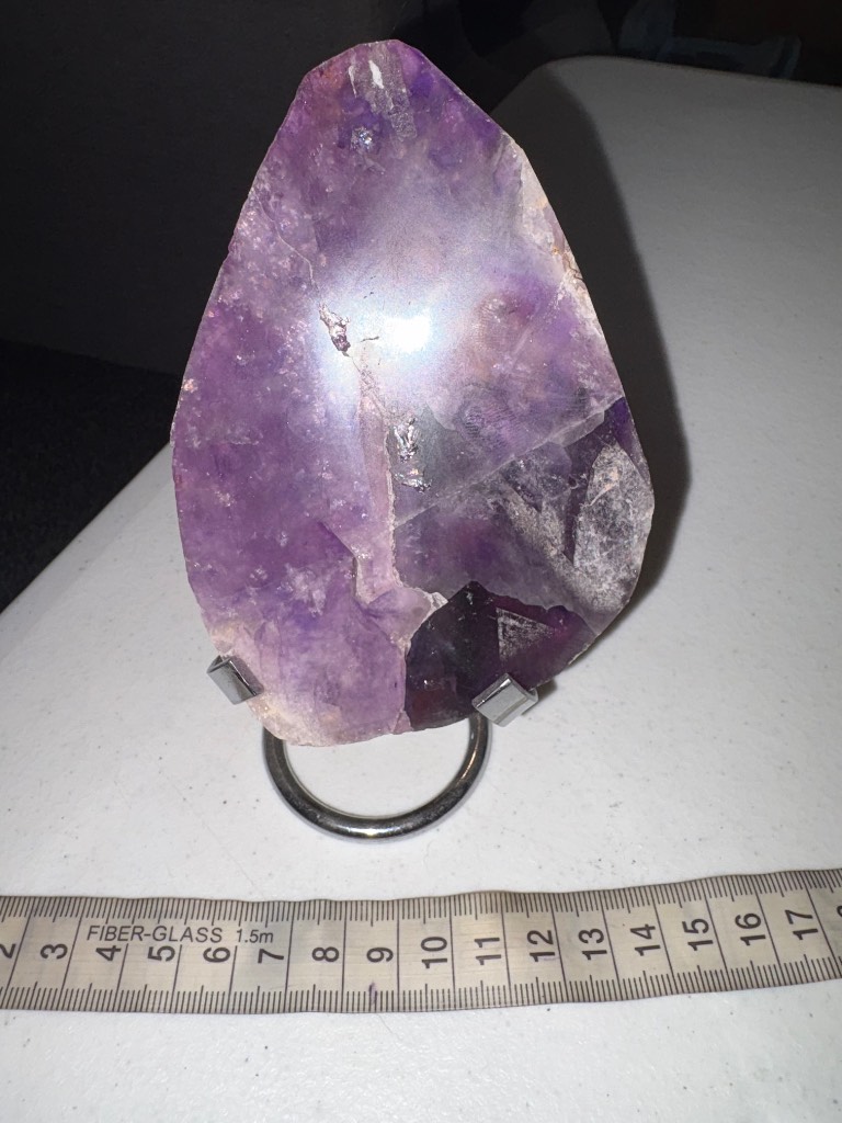 Purple fluorite slab with silver stand