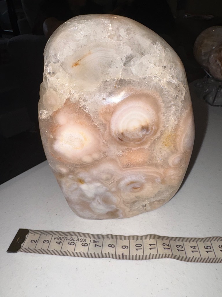 A stunning large pink amethyst free form with natural Druze caves