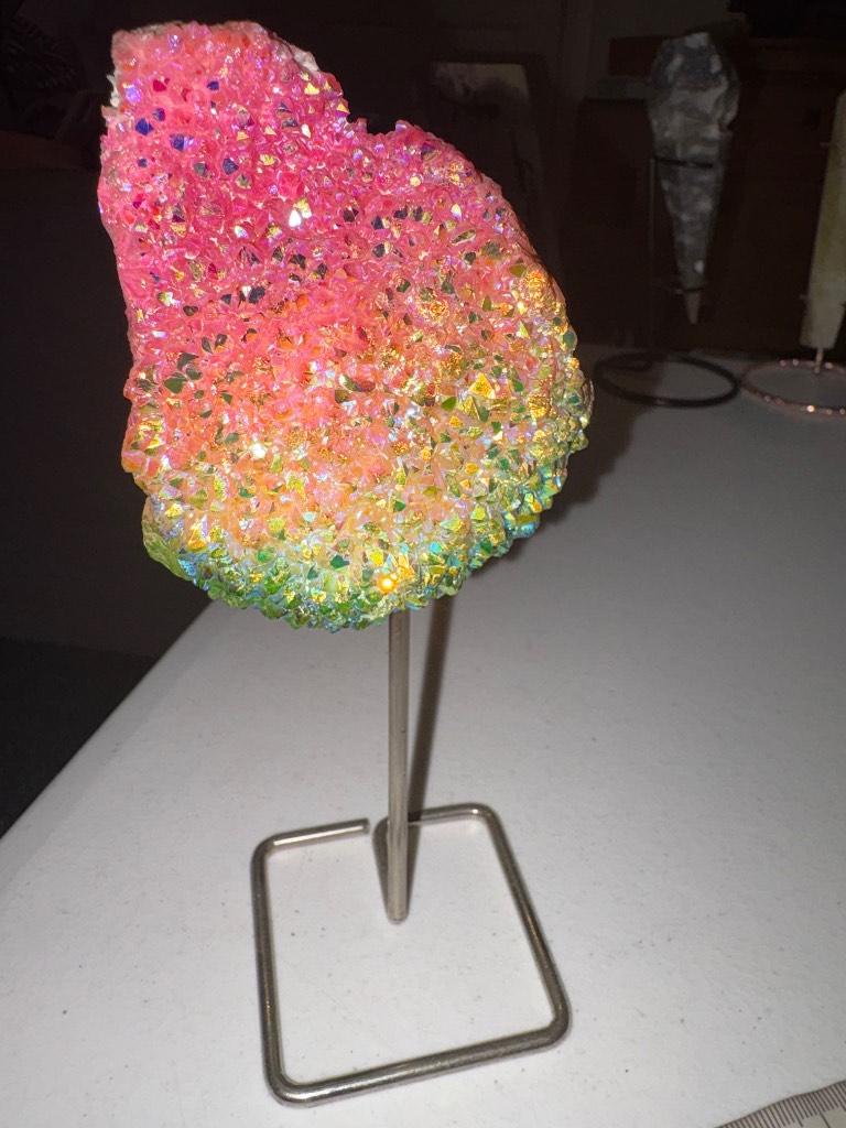 Aura Quartz free form on silver stand