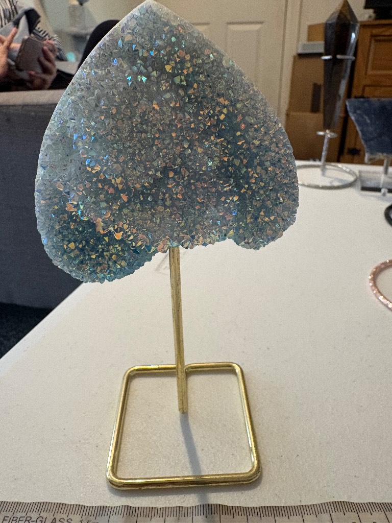 Aura quart 2 free form on a golden coloured stand