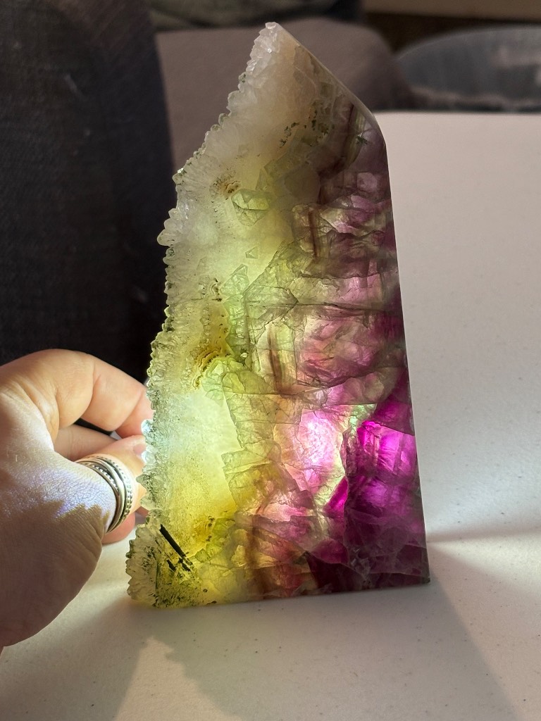 Beautiful fluorite tower with druzy down one side