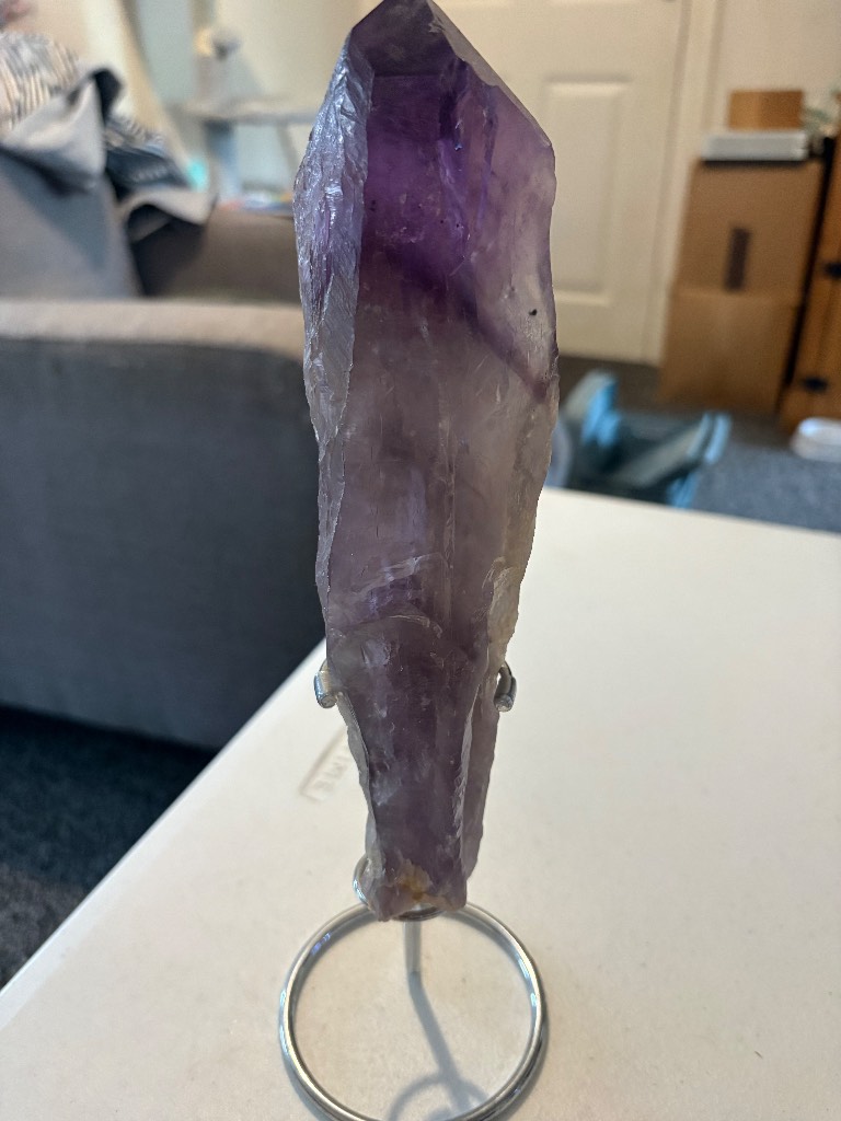 Large amethyst wand with silver stand