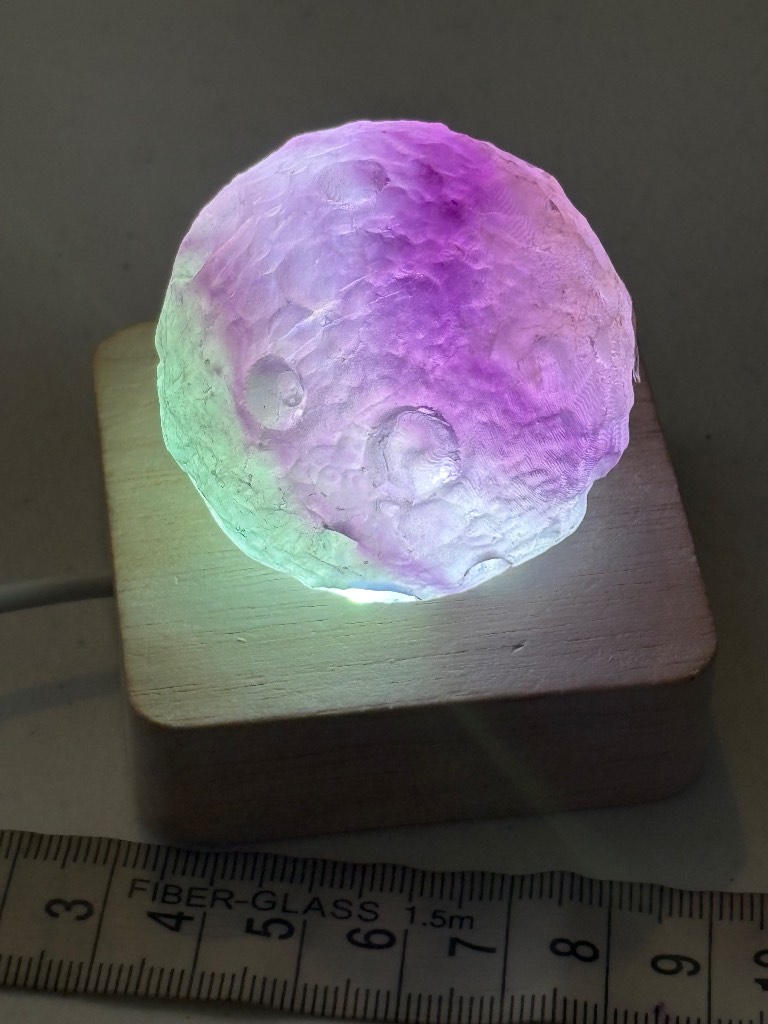 Stunning moon fluorite sphere.