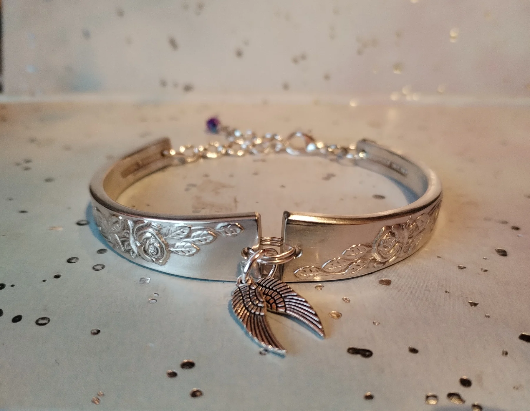 Handmade Spoon Handle Bracelet | Silver Plated Silverware Bangle with Angel Wing Charms