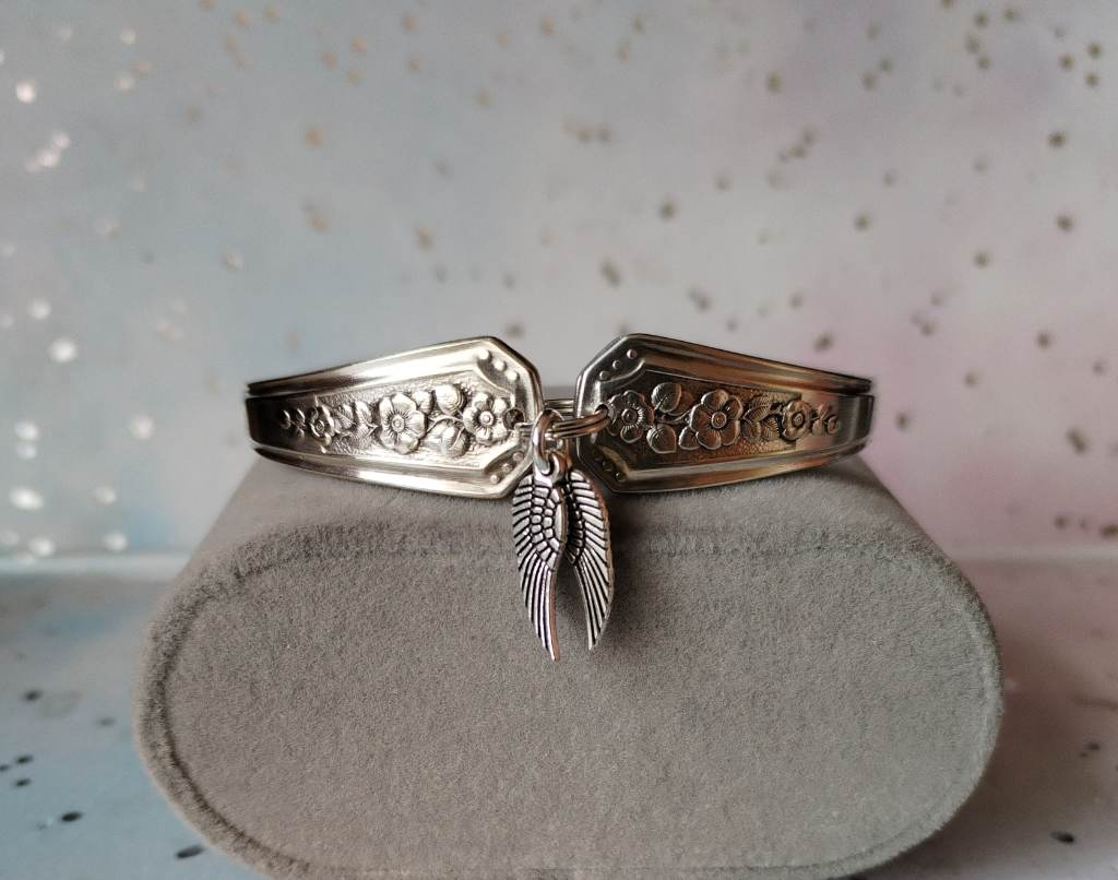 Handmade silver plated spoon handle bracelet with Angel wing charms.