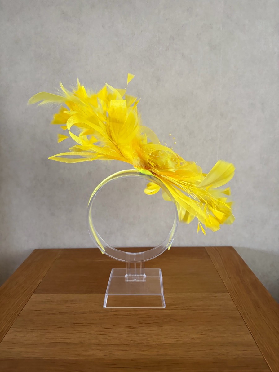 Yellow fascinator with feathers - New