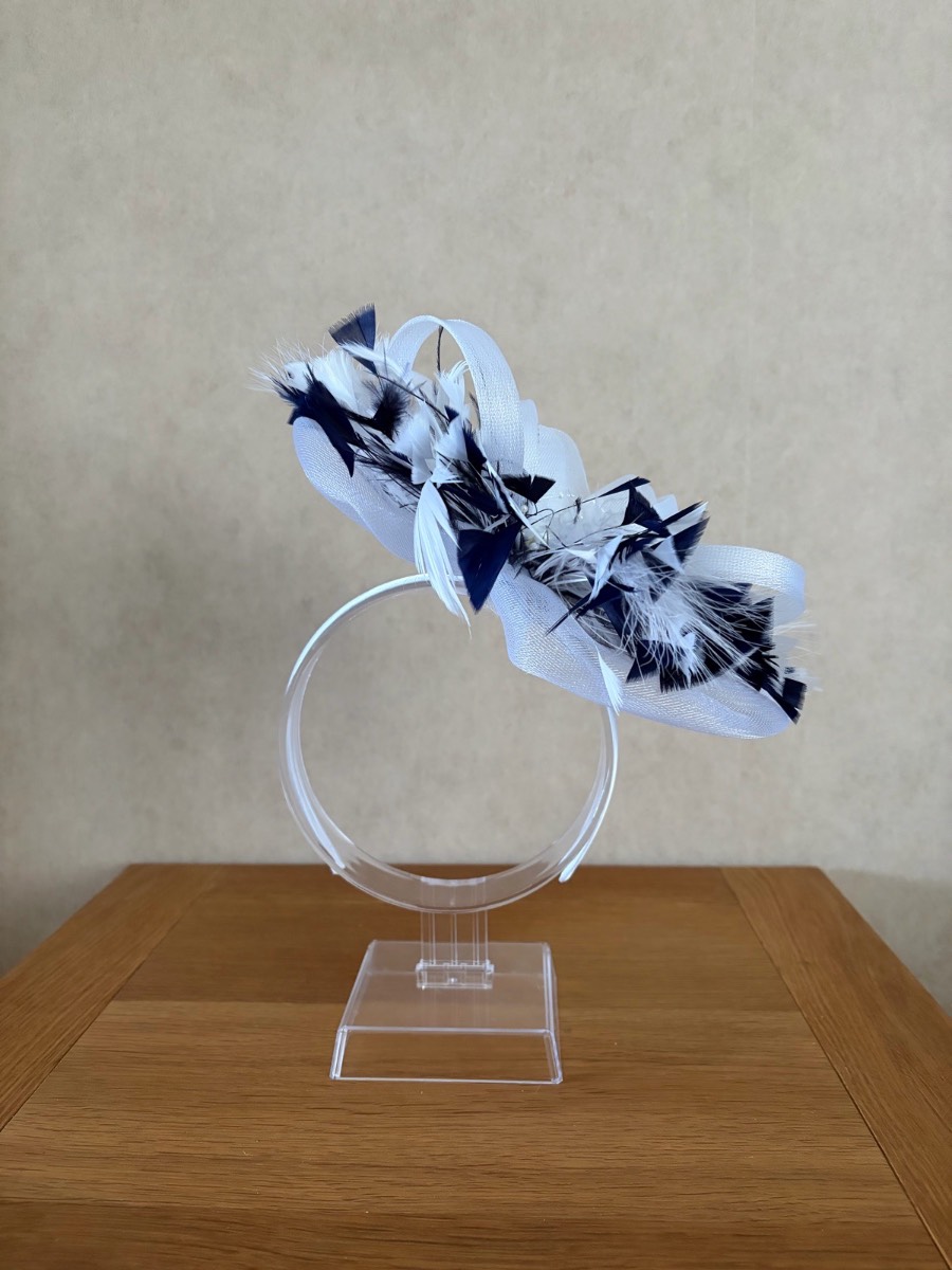 White fascinator with navy feathers - New