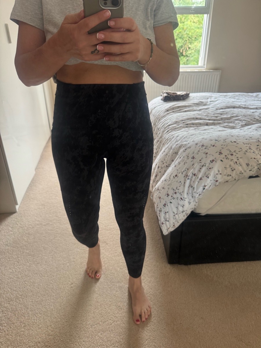 Sweaty Betty Runner's High Power Leggings in the Black Cliff Face Print.