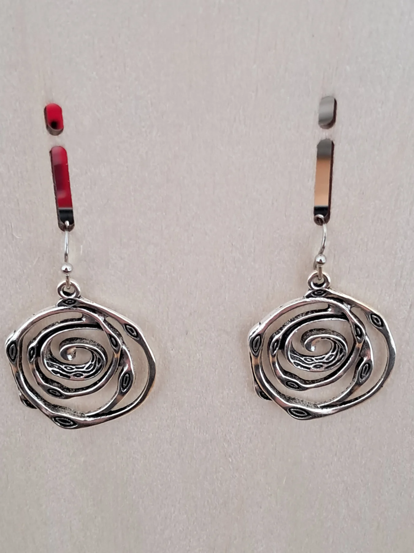 Silver spiral drop earrings