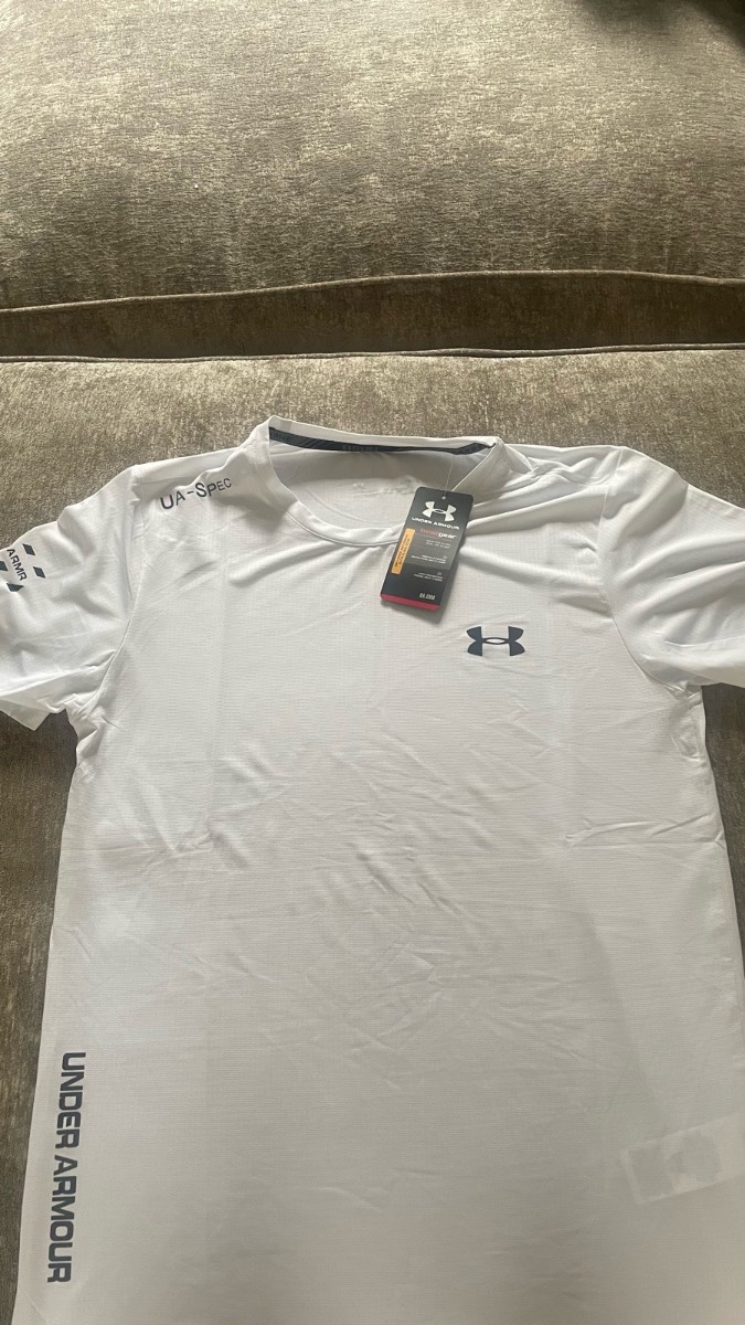 Under armour white training t shirt.