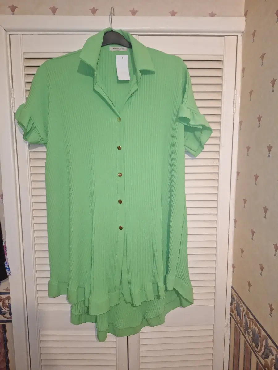 Green knee length dress