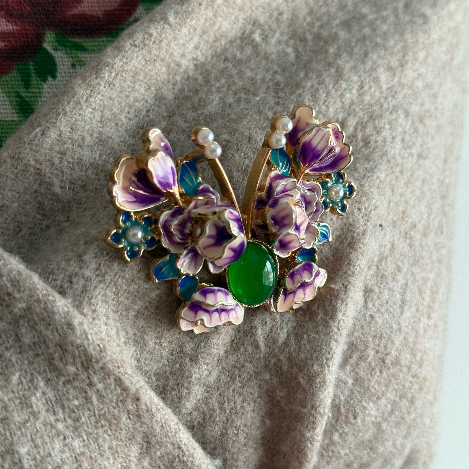 Beautiful vintage floral brooch with green and purple flowers
