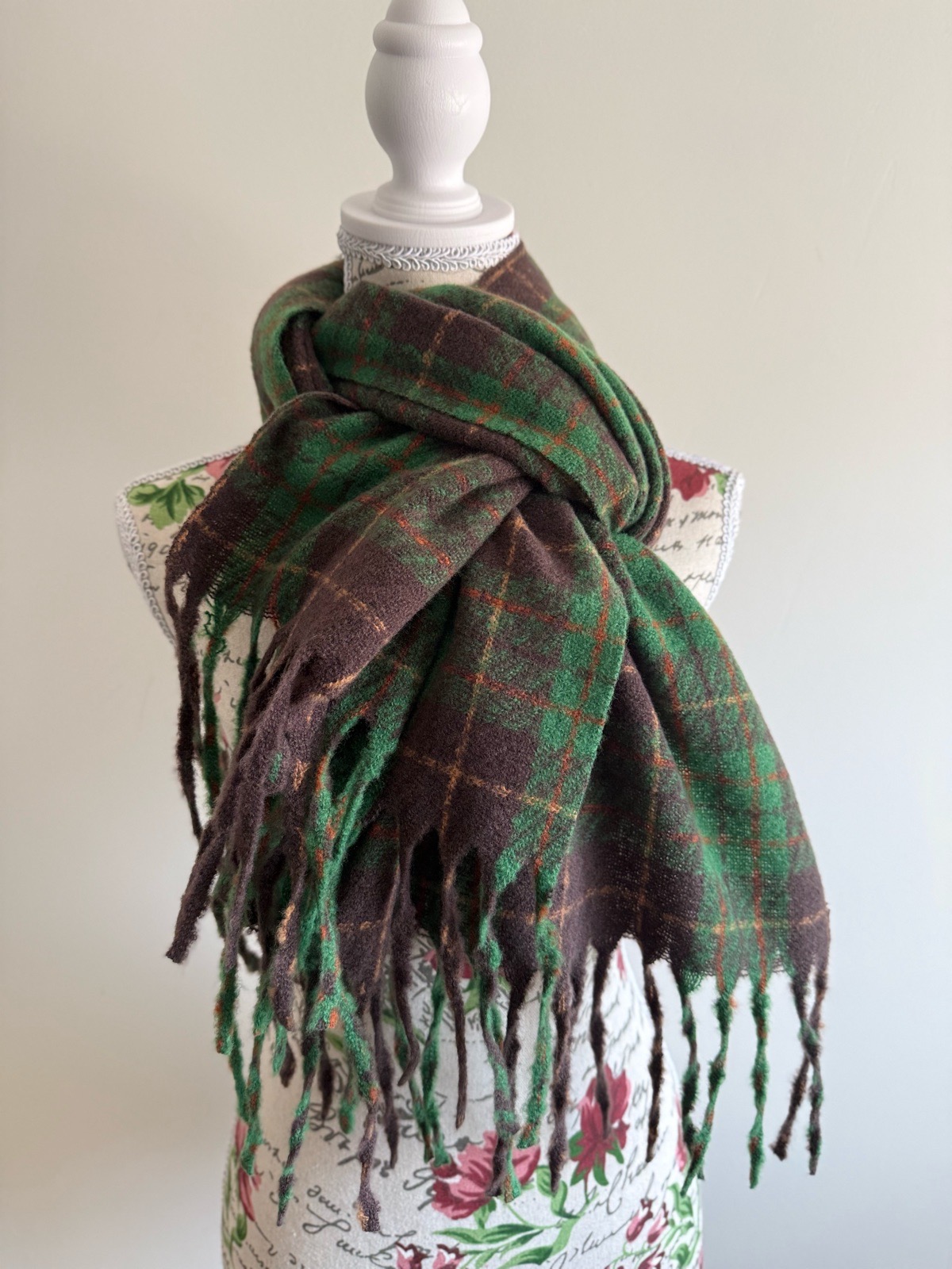 Green and brown plaid scarf with fringe