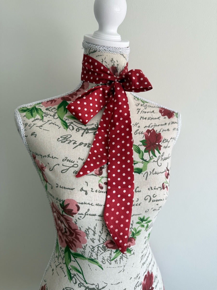 Red polka dot scarf with white dots