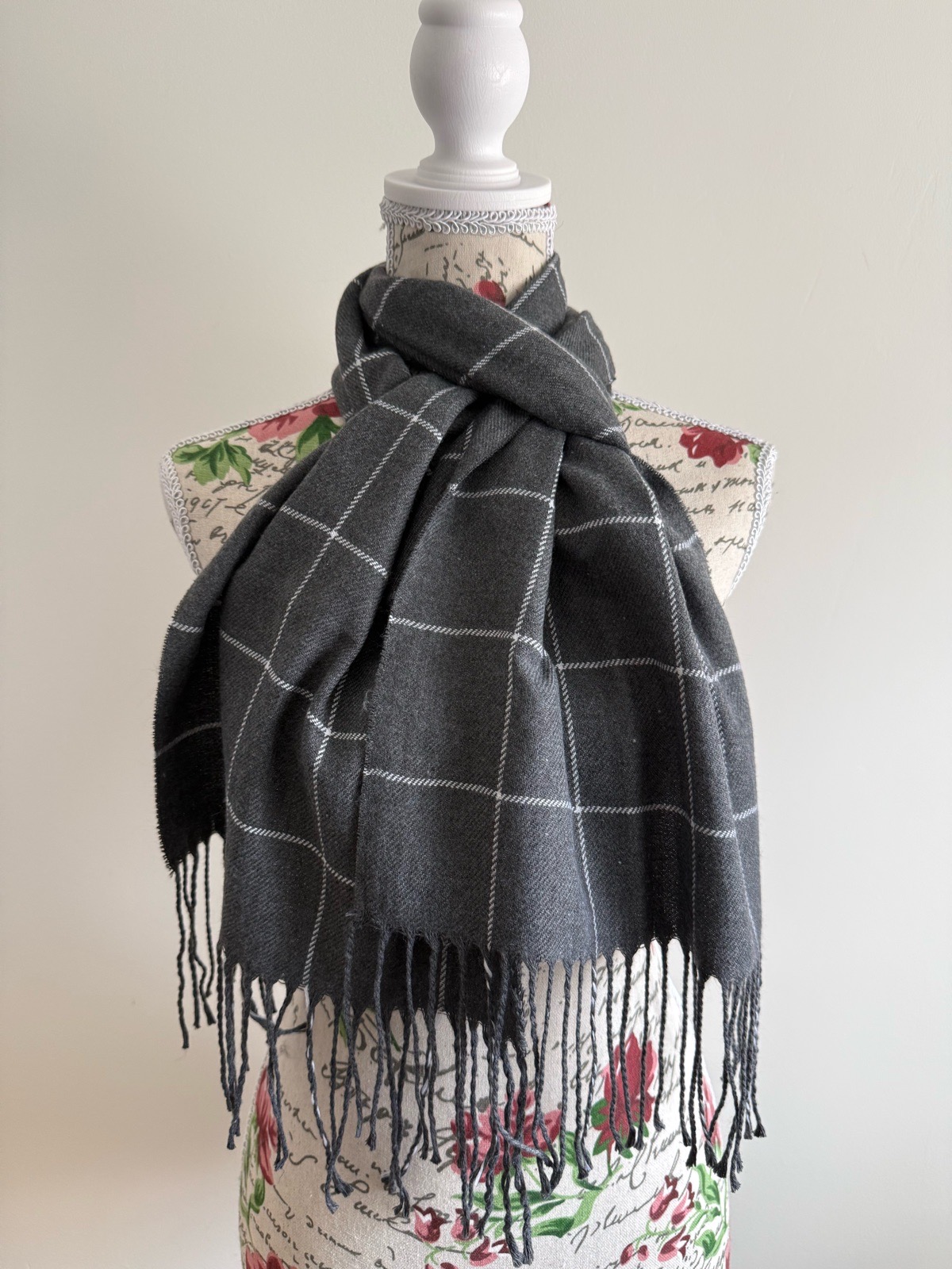 Grey and white plaid scarf with fringe