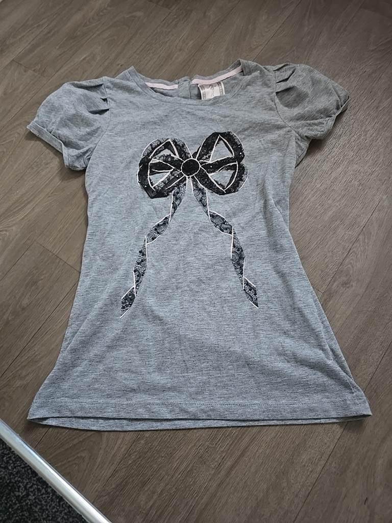 next tshirt size 8