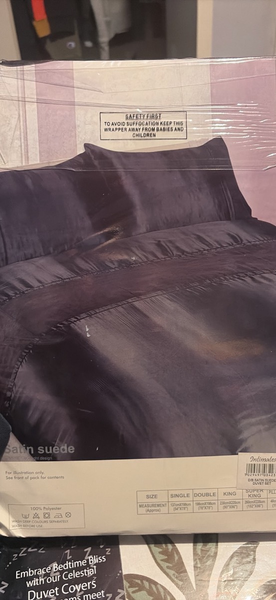 Brand new double duvet set in black satin