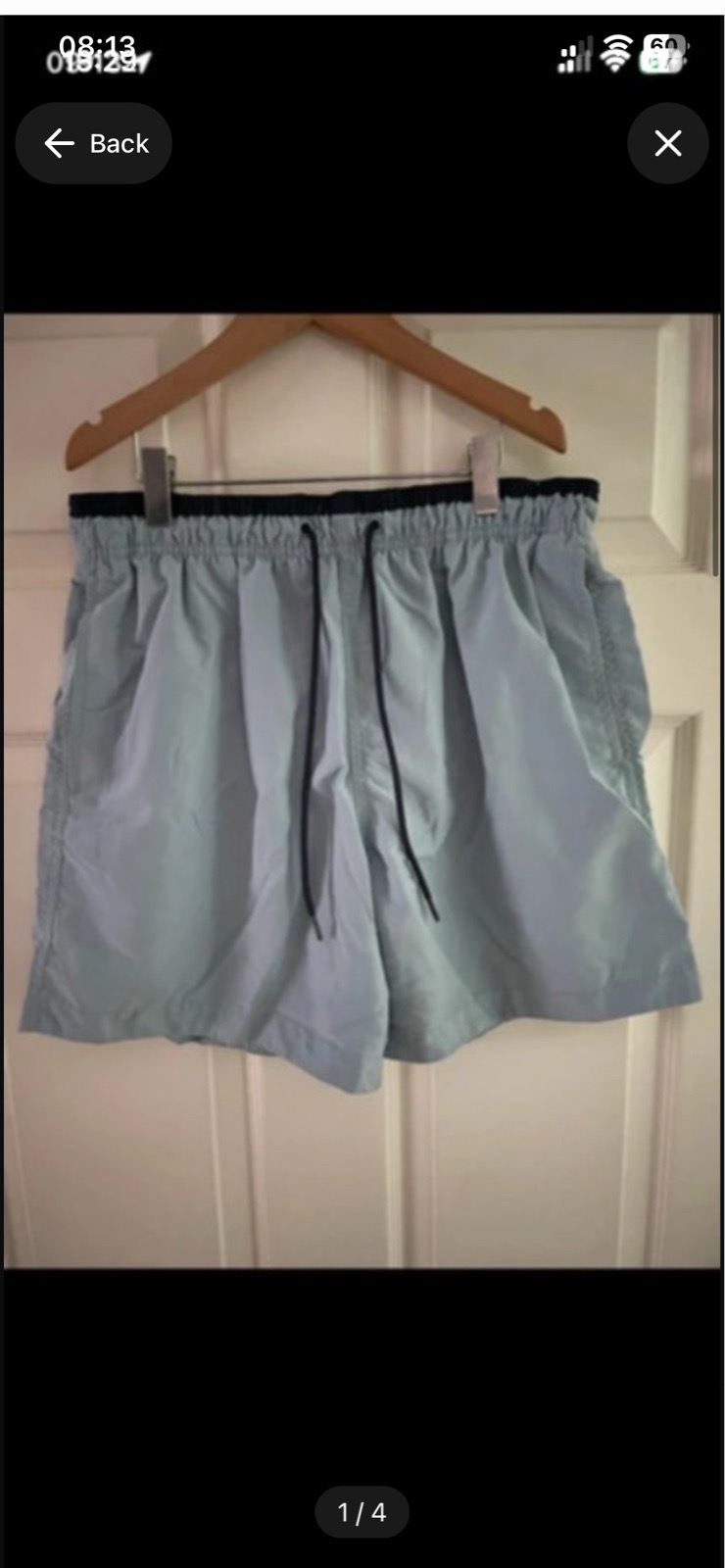 H&M turquoise swimming shorts in size medium