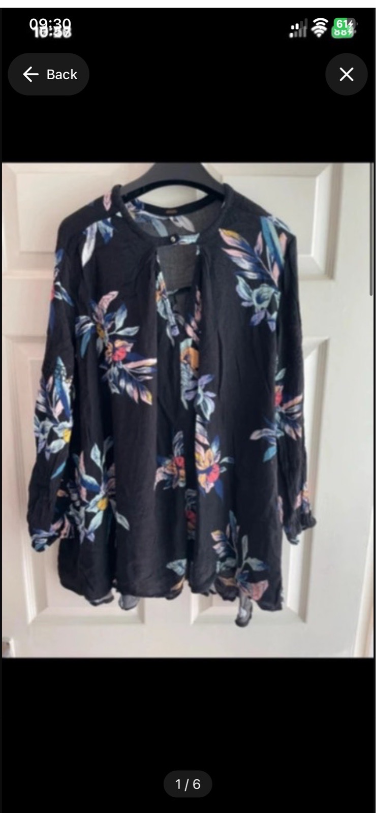 Free people floral long sleeved blouse in size medium
