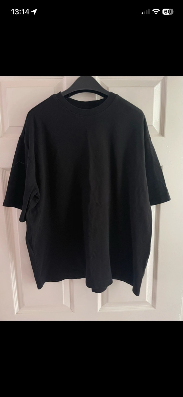 Primark short sleeve T-shirt in black in size large