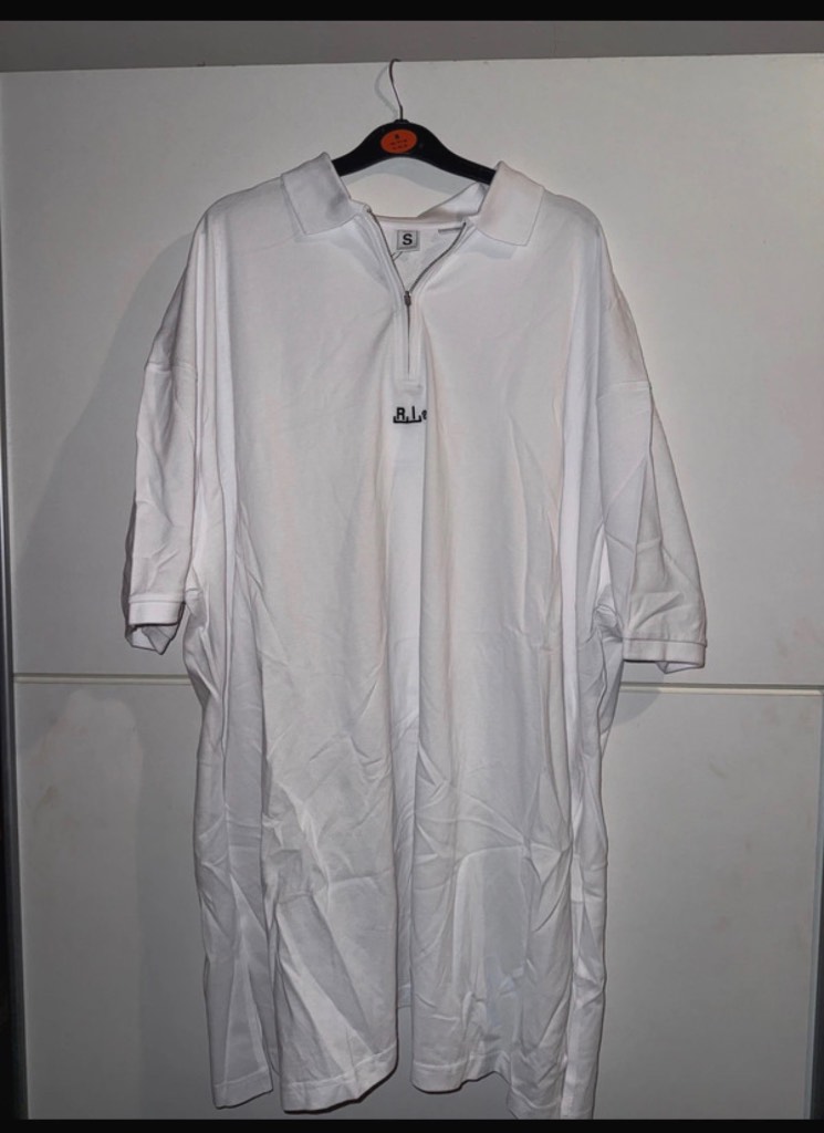 Oversized white polo shirt