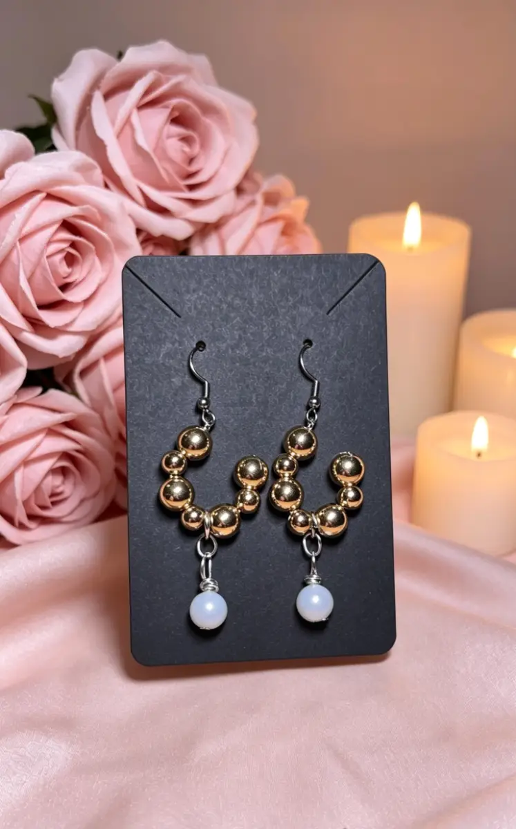 Gold half hoop with pearl earrings