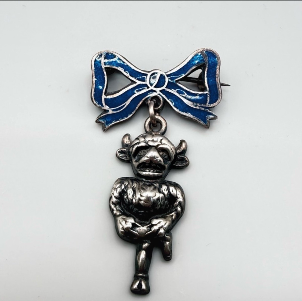 vintage sterling silver and blue enamel Lincoln imp brooch/