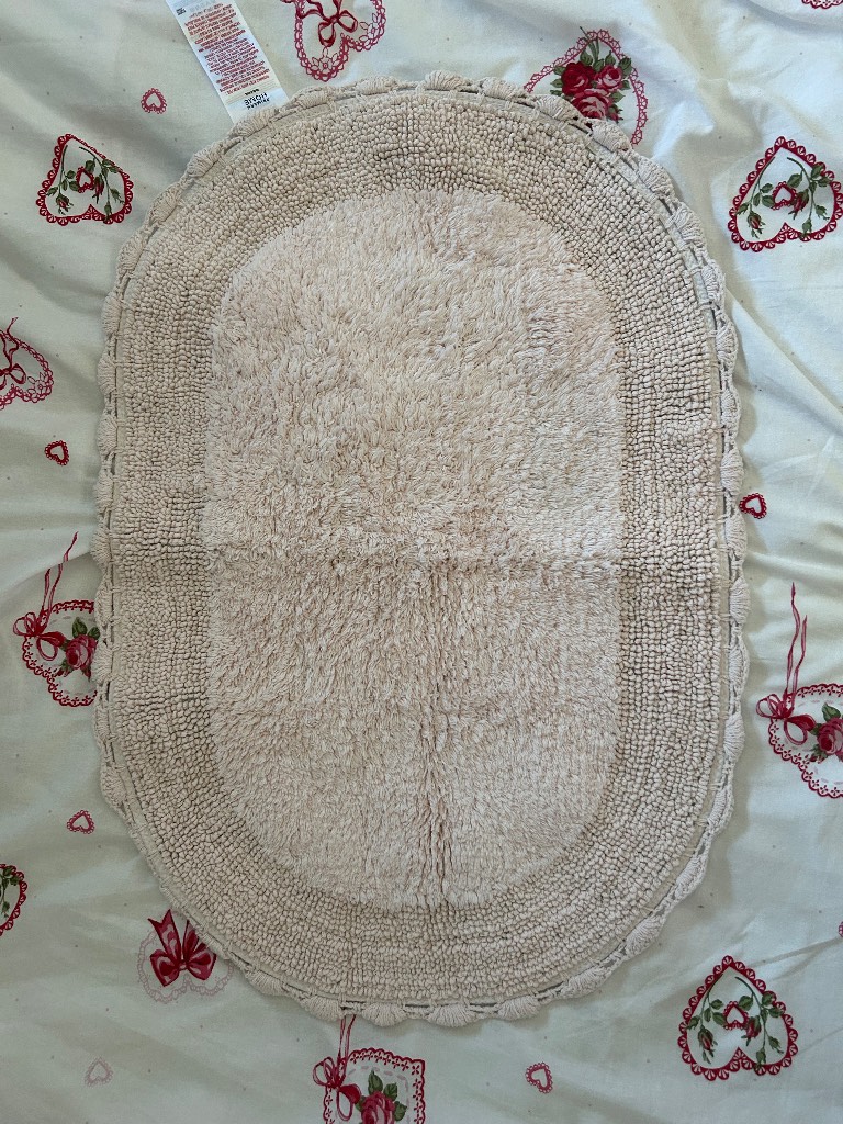 Primark pink oval bath mat