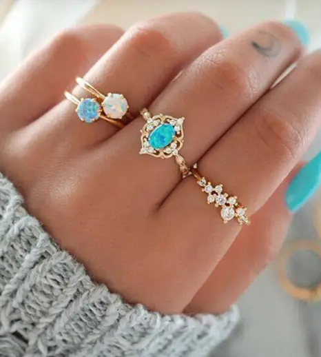New Set of Four Gold-Coloured Alloy Rings with Gemstones