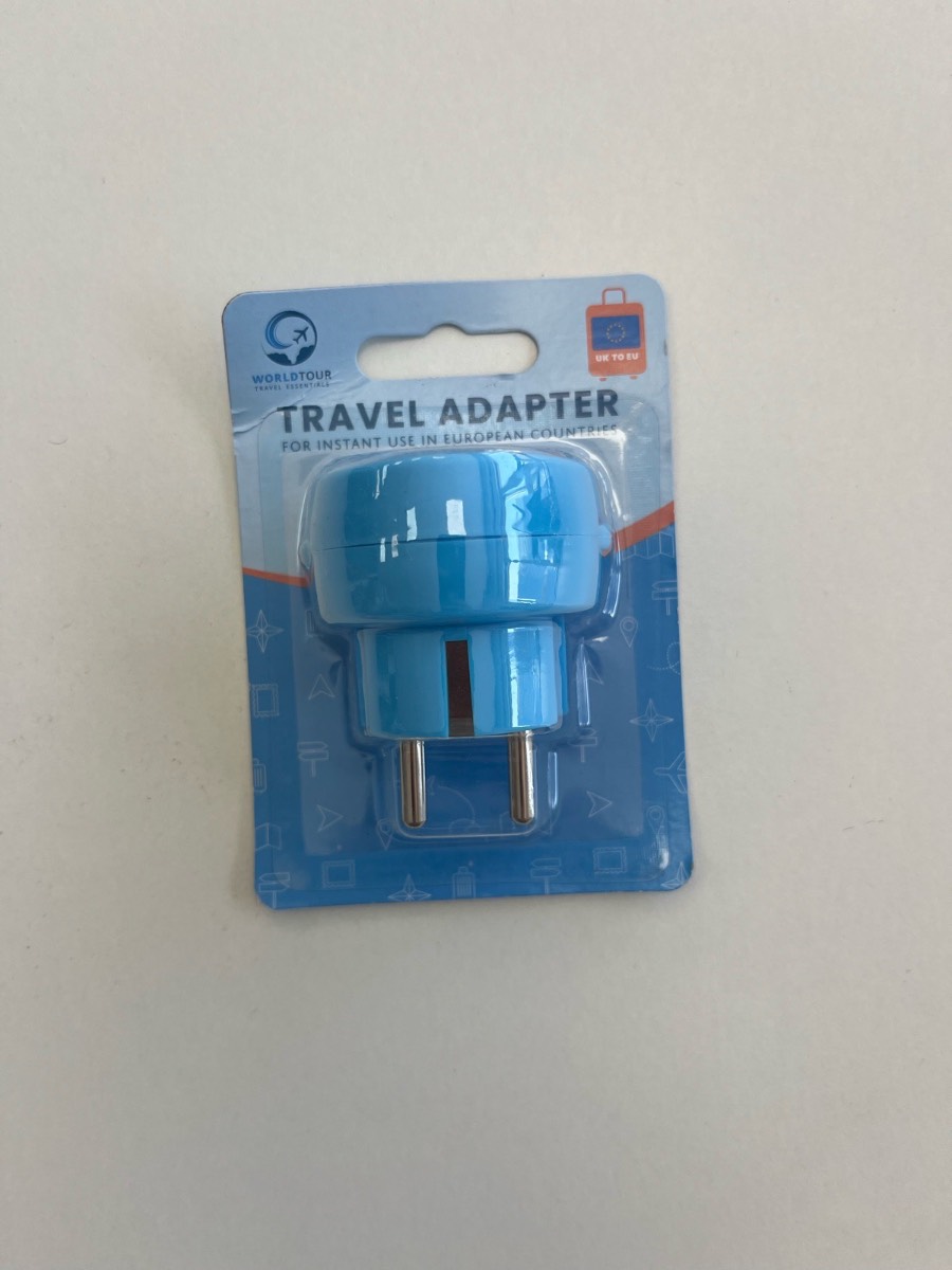 Blue travel adapter UK to EU