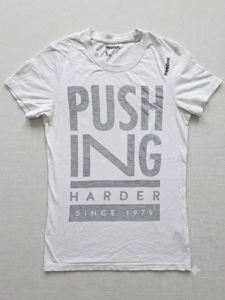 Reebok Women's White Graphic T-Shirt Size S Small "Pushing Harder" Crew Neck Gym Tee