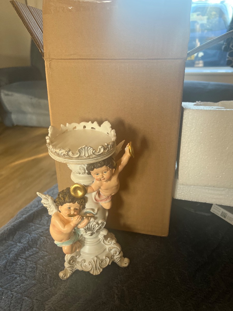 Cherub angel candle holder