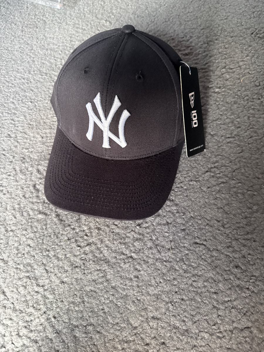 NY cap