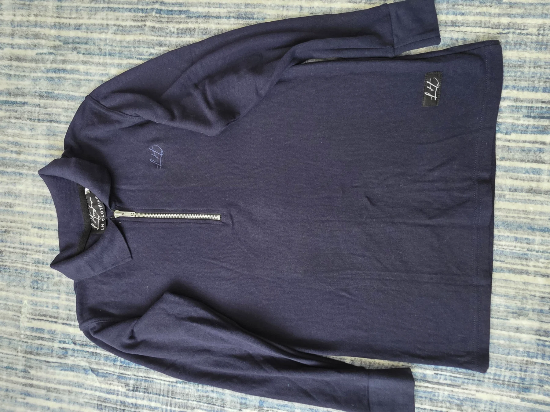 A sleek navy quarter‑zip top from LH Clothing, size S