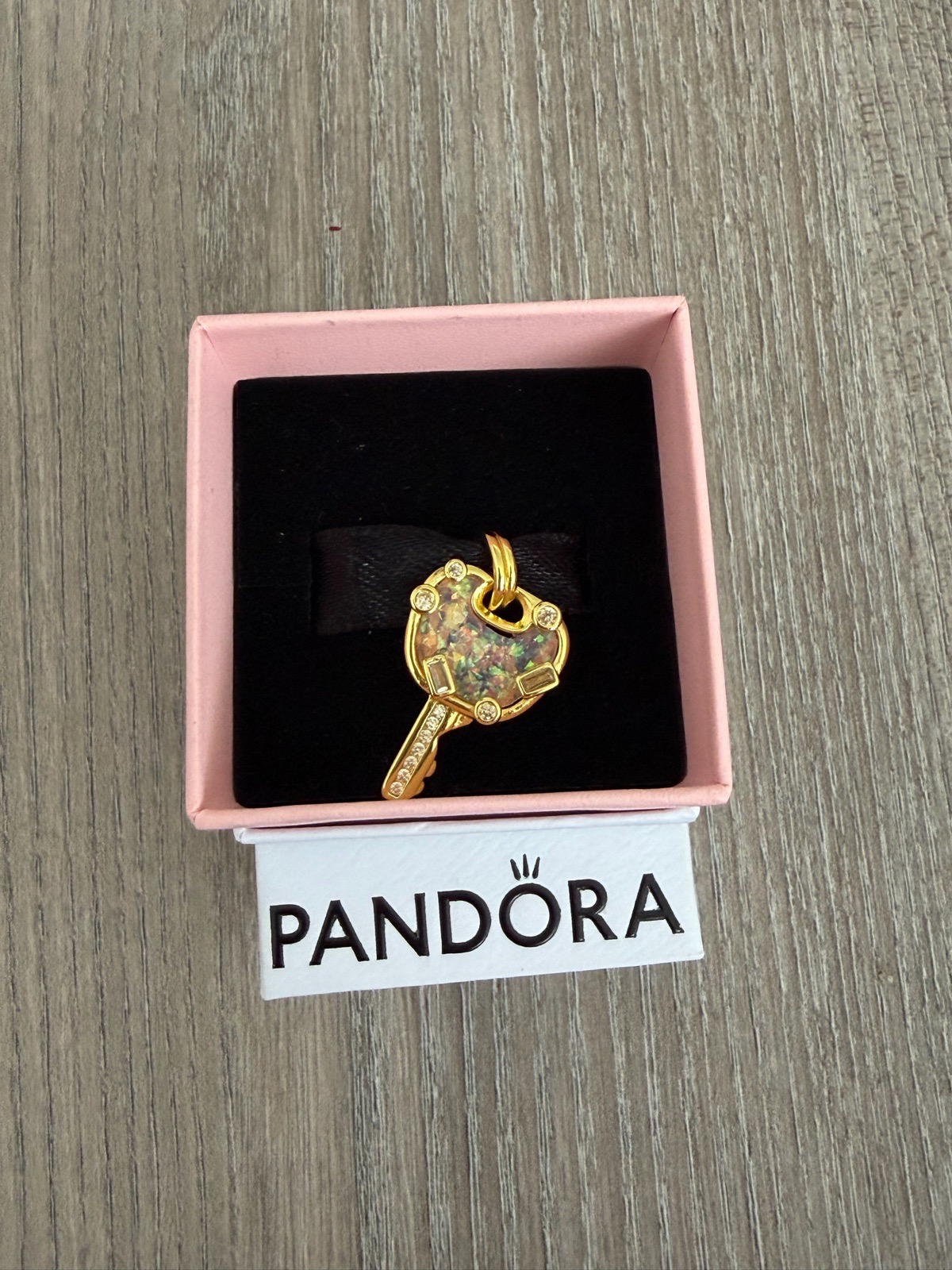 Gold love key charm