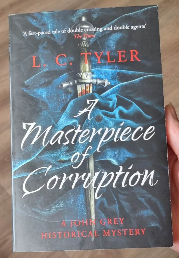 A Masterpiece of Corruption (A John Grey Historical Mystery)" by L. C. Tyler
