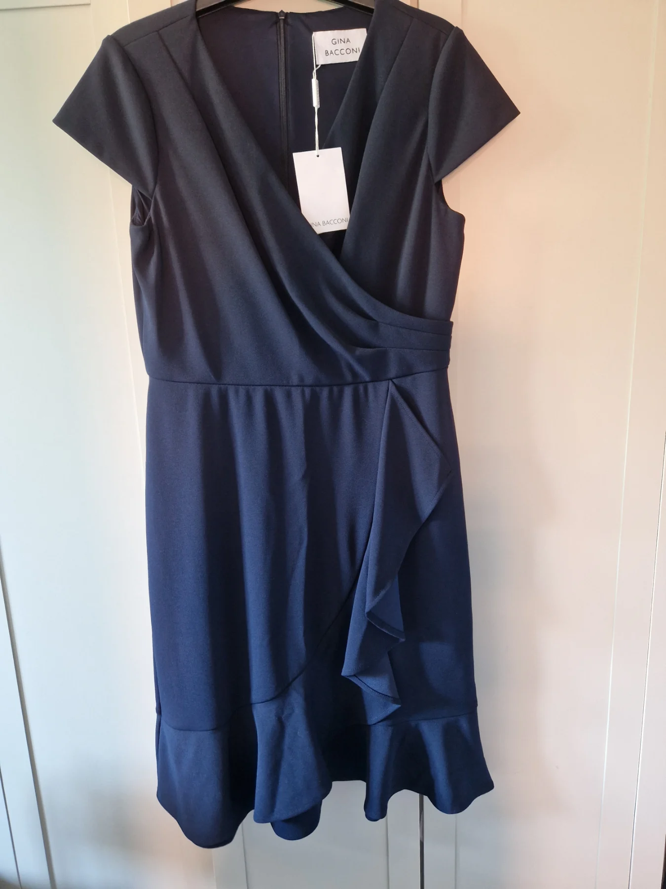 Gina Bacconi Blue Ruffle Hem Crepe Dress