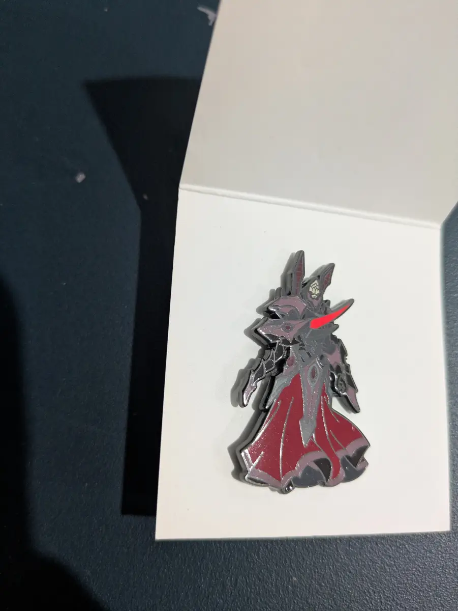 Alarak lapel pin
