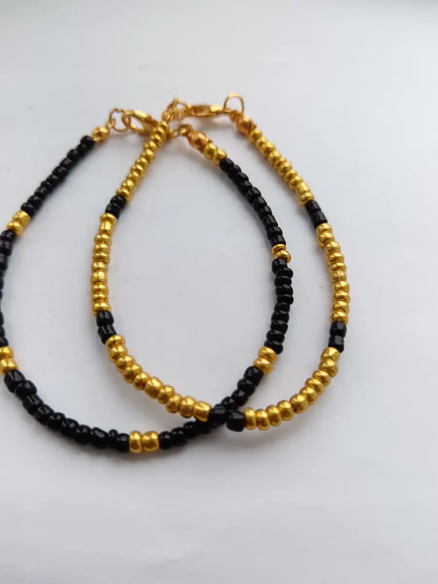 Black and golden bracelets set