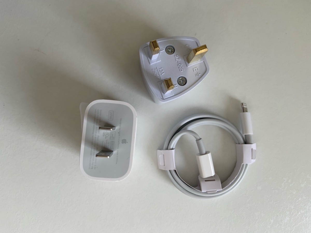 Genuine Apple 20w USB C Charger a USB C-C Cable and an Adapter plug