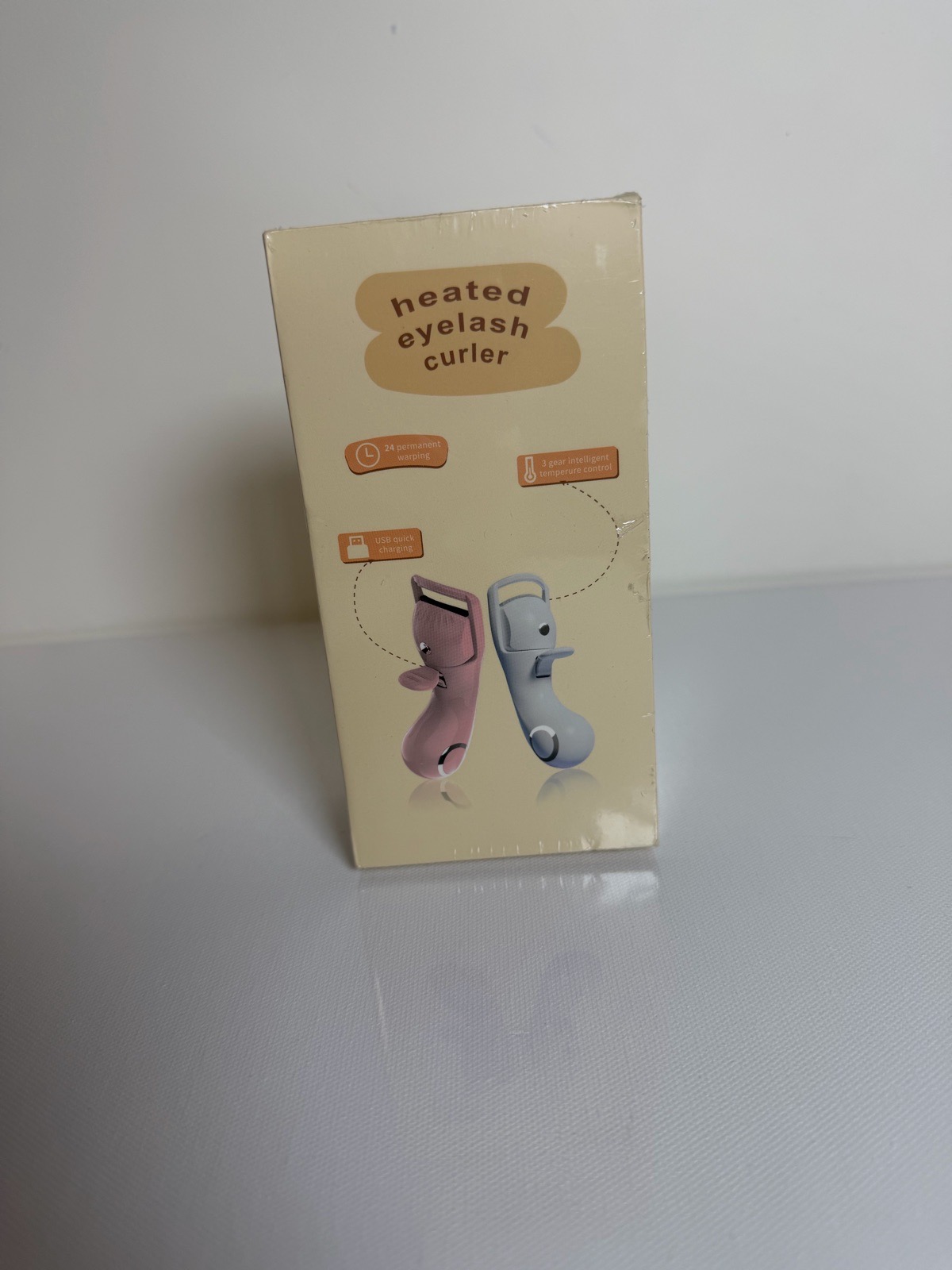 Heated eyelash curler