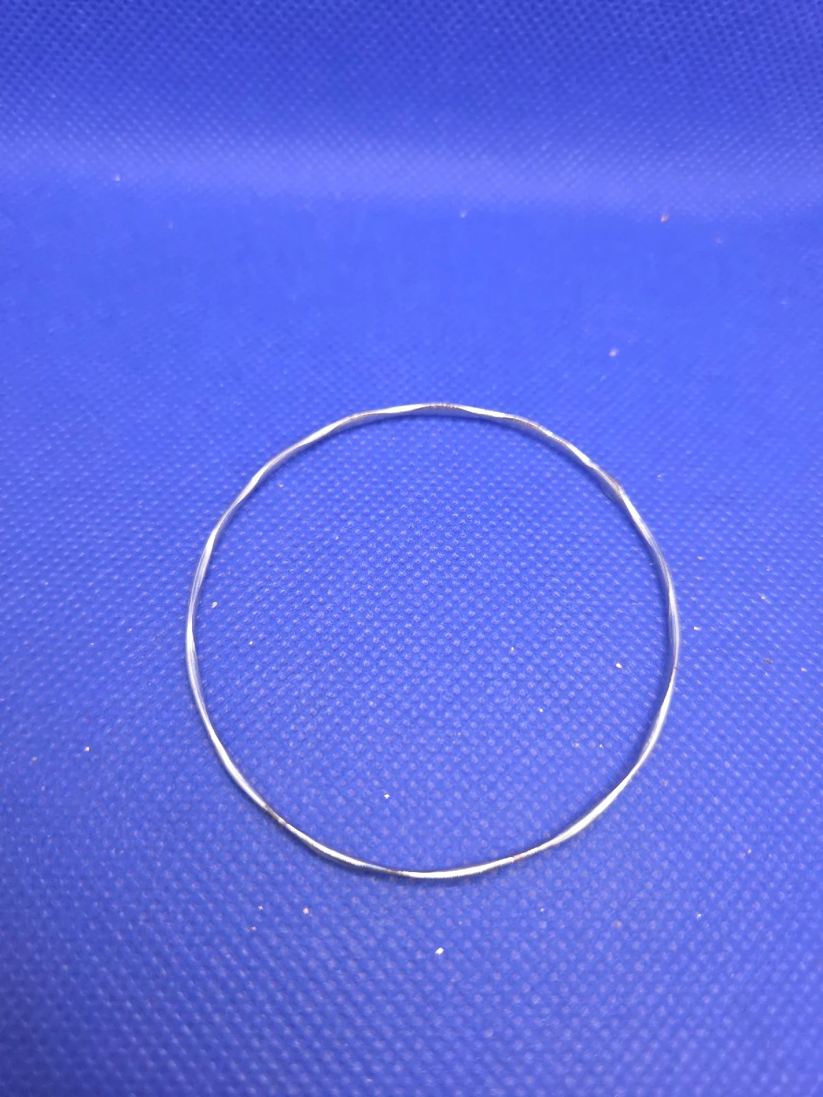 Twisted Silver Tone Slim Bangle Bracelet