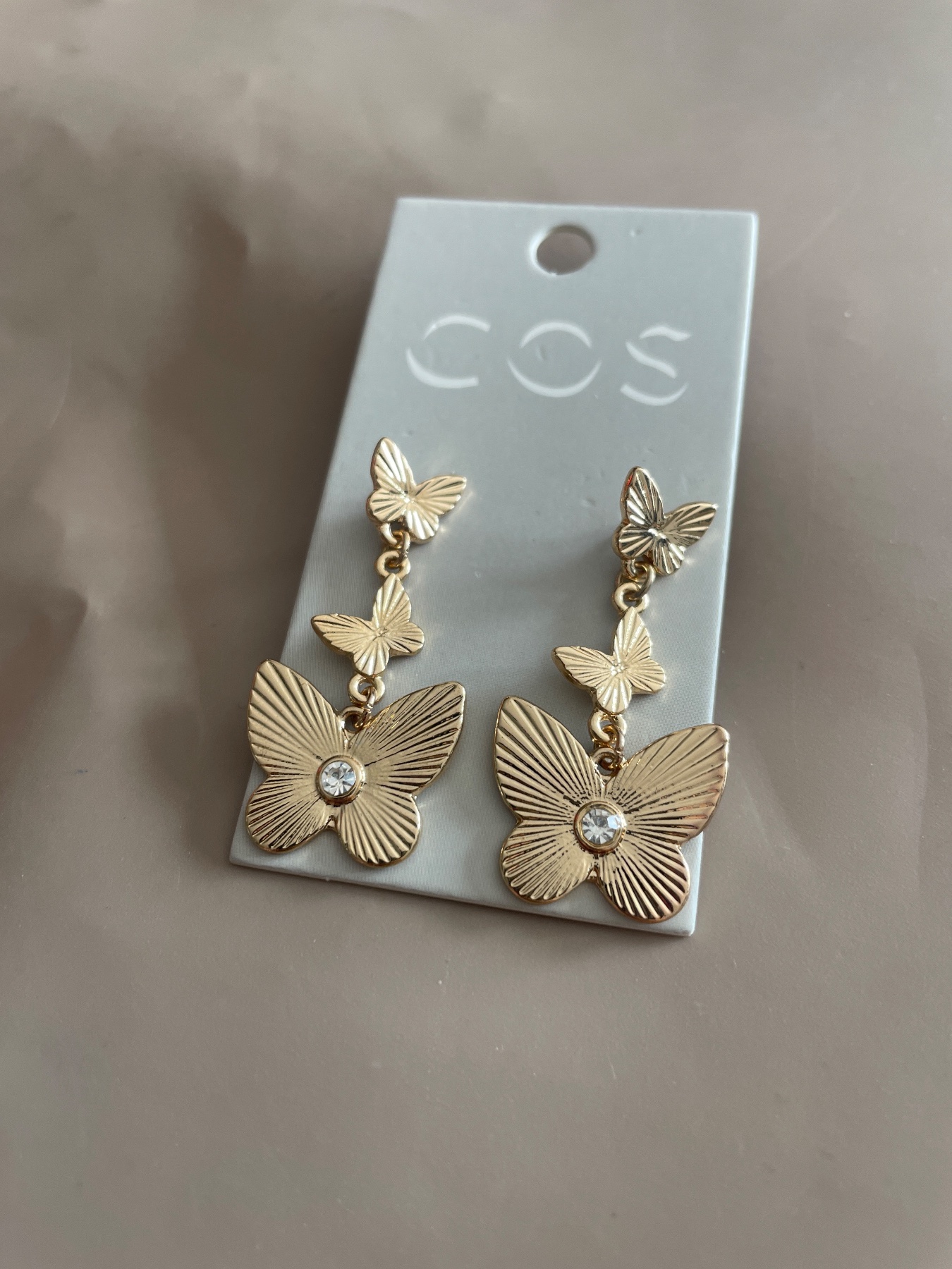 COS butterfly earrings