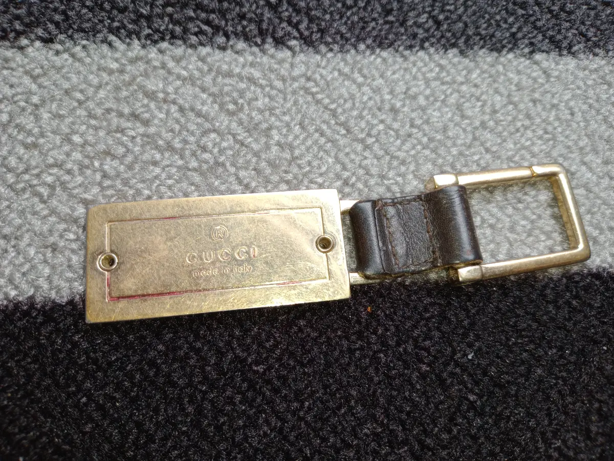 Gucci unisex brass and leather keyring Y2K era