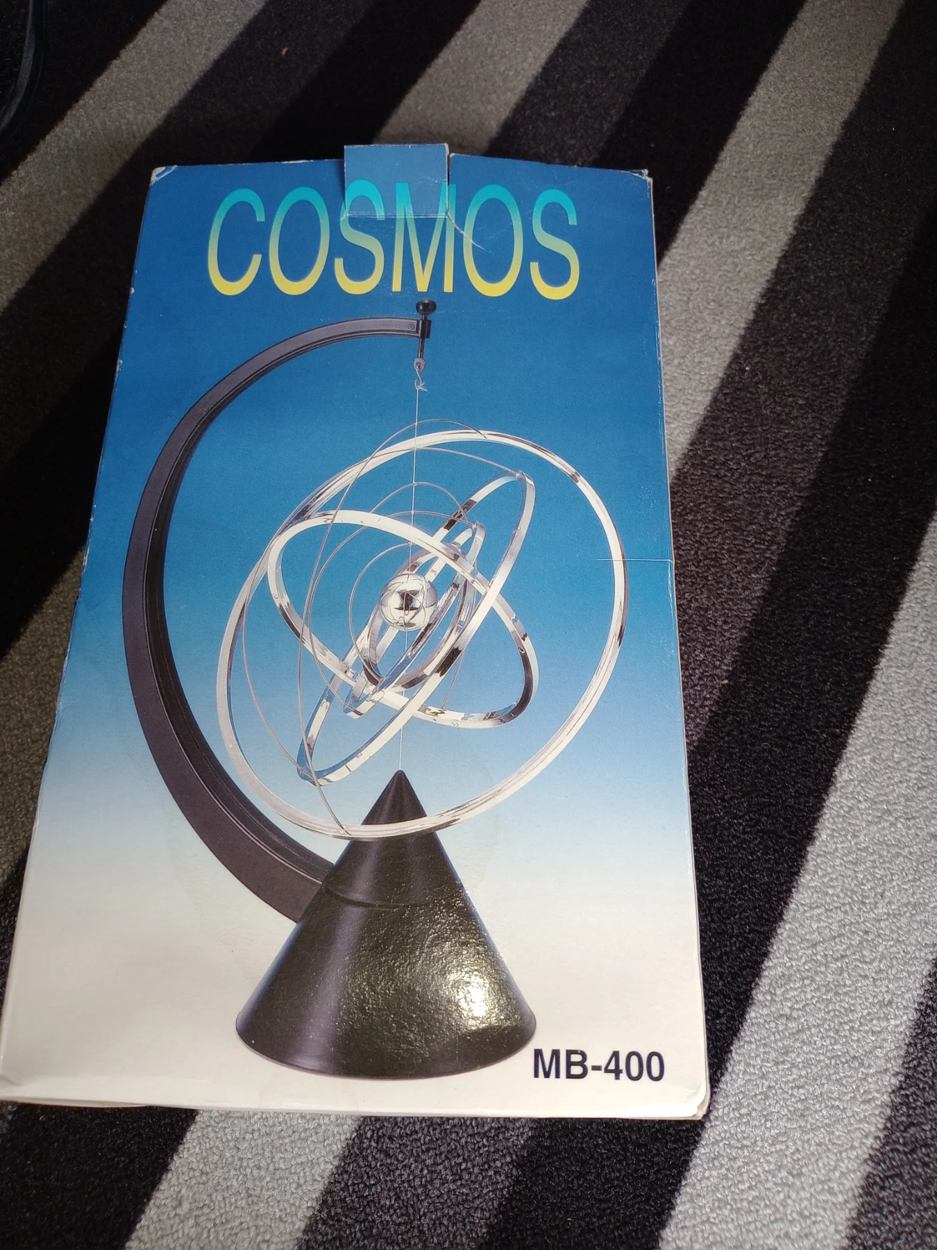 Vintage perpetual motion cosmos 1990s desk toy