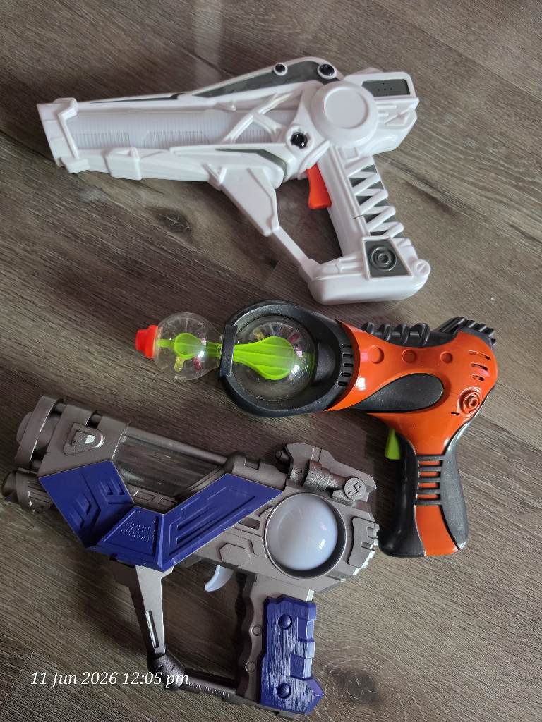 Bundle of battery operated play guns