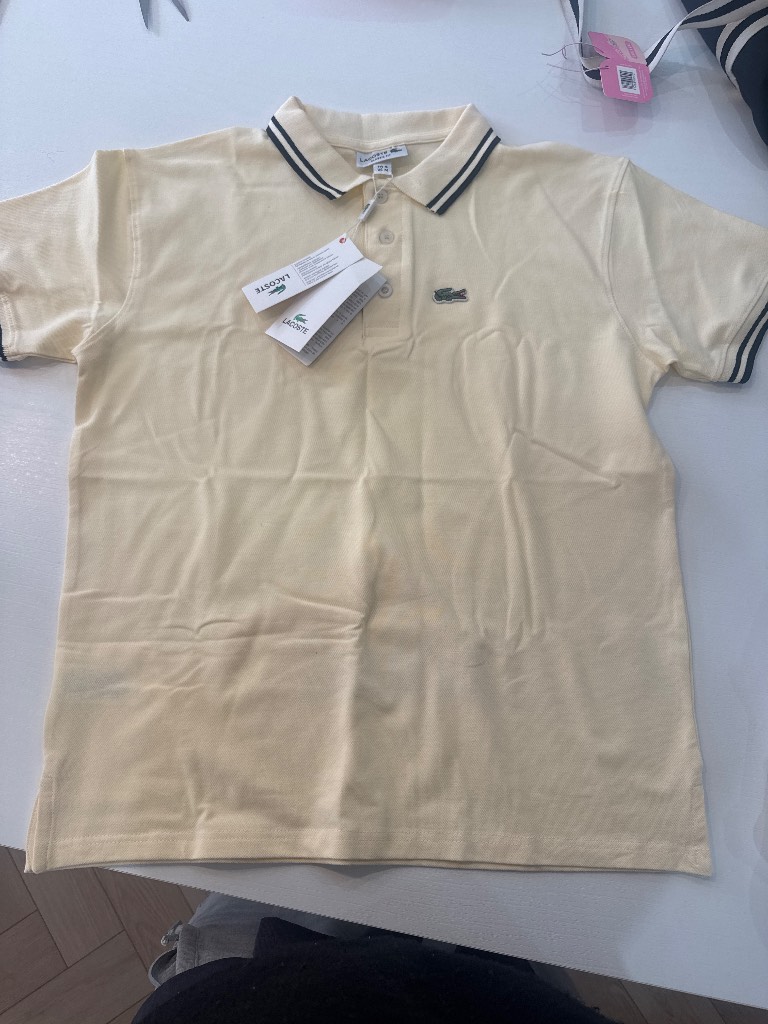 Lacoste medium men’s cream polo shirt