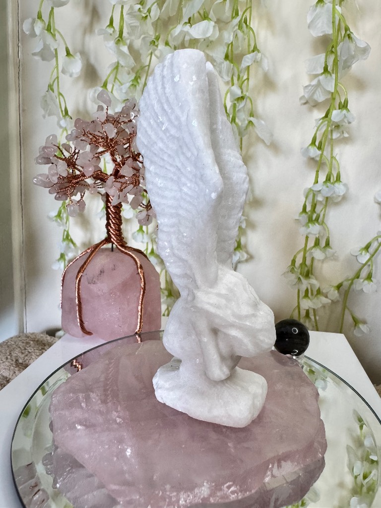Sparkly white jade praying kneeling angel